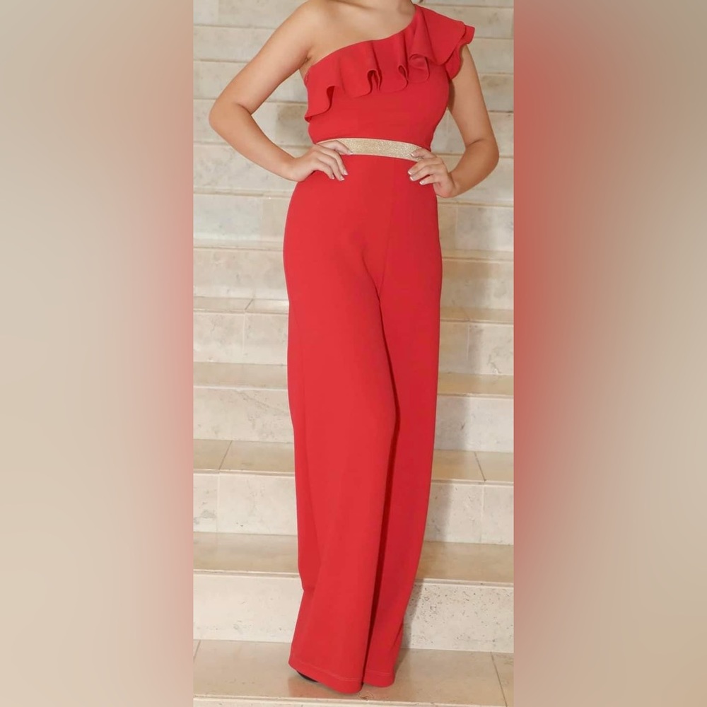 Red jumpsuit with gold belt
